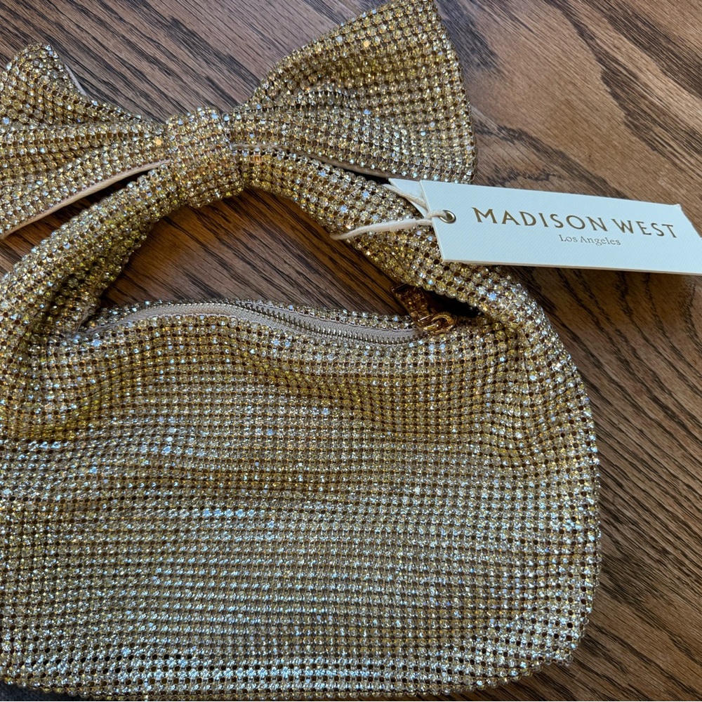 Madison West Gold and rhinestone sparkle Bow Handbag